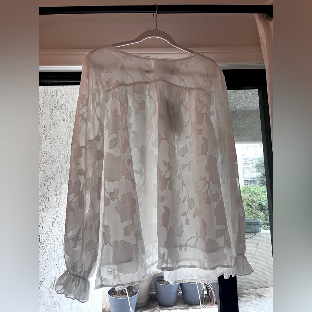 Funlingo white long sleeved blouse, size XL. Never worn, new with tags.